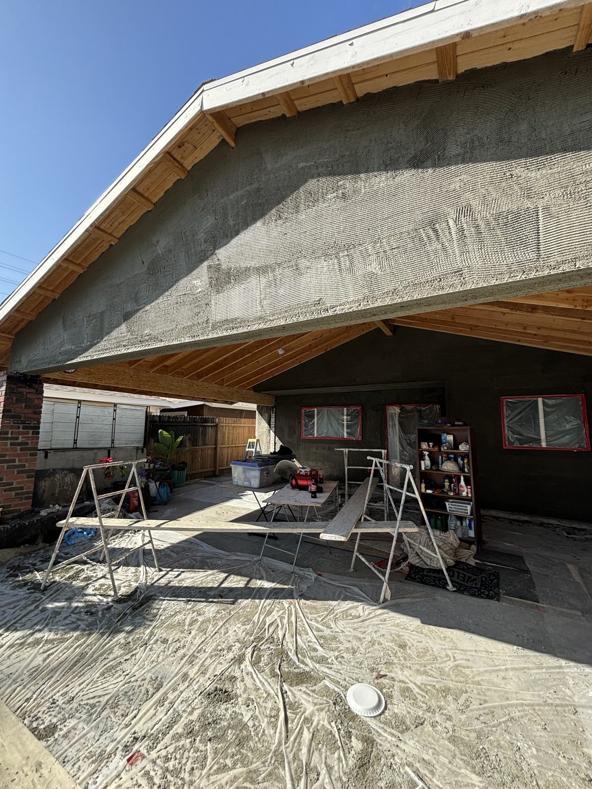 Scratch coat on a garage under construction