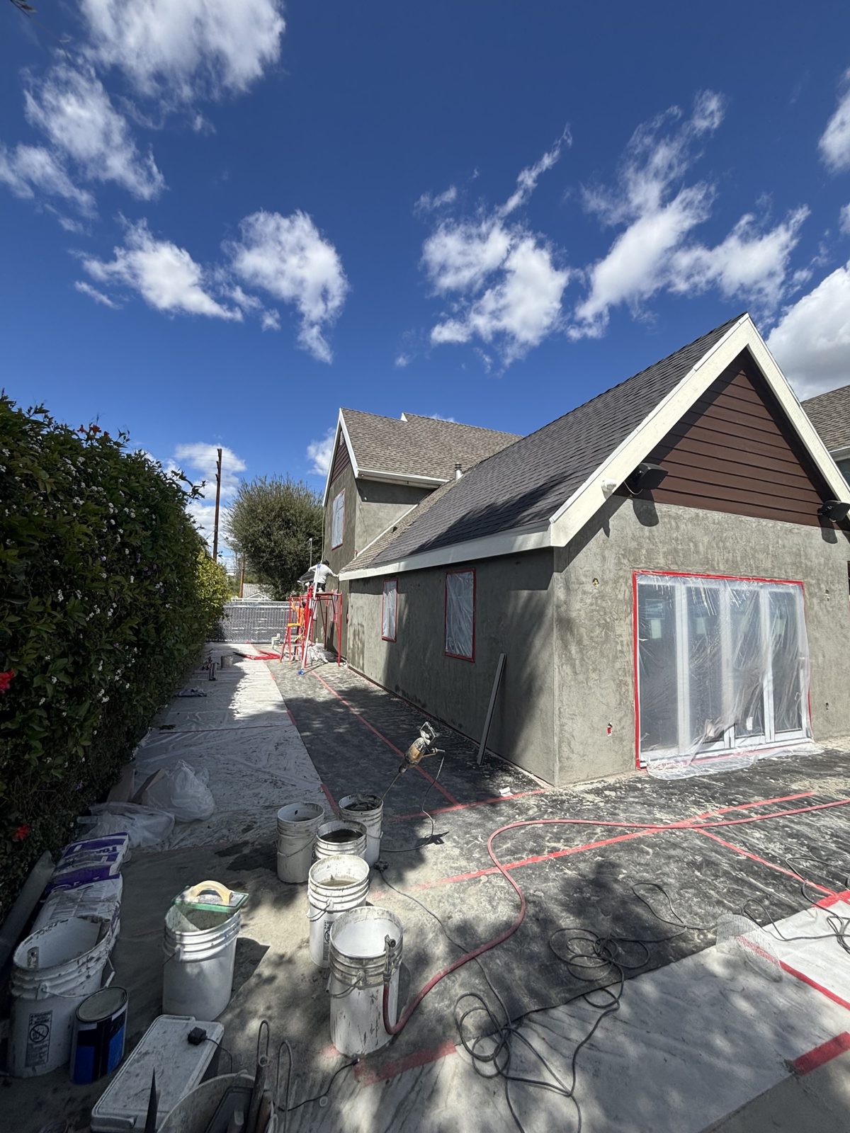 Home exterior with fresh stucco on a sunny day